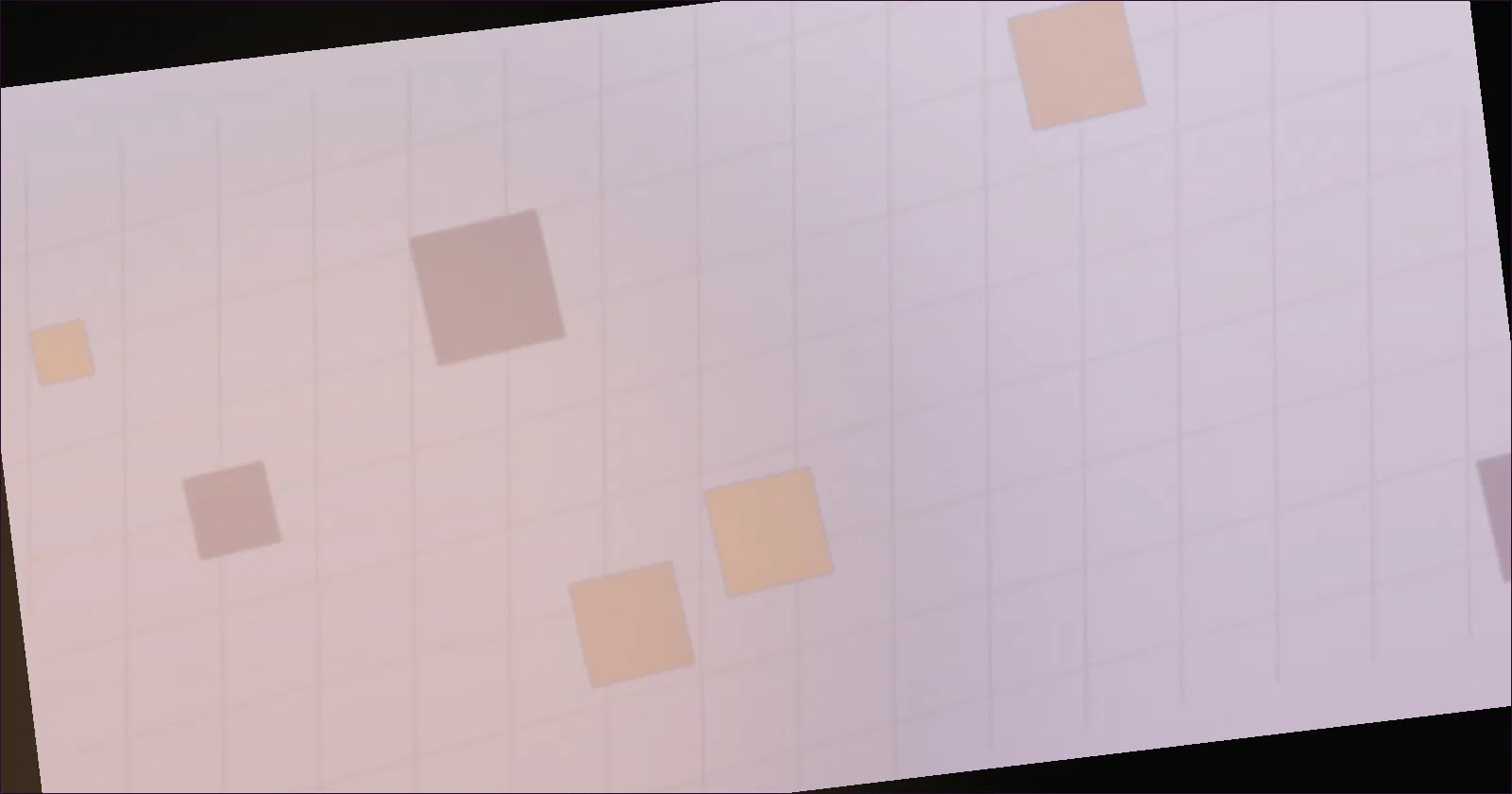 A notepad with a numbered list beside a laptop showing a code editor