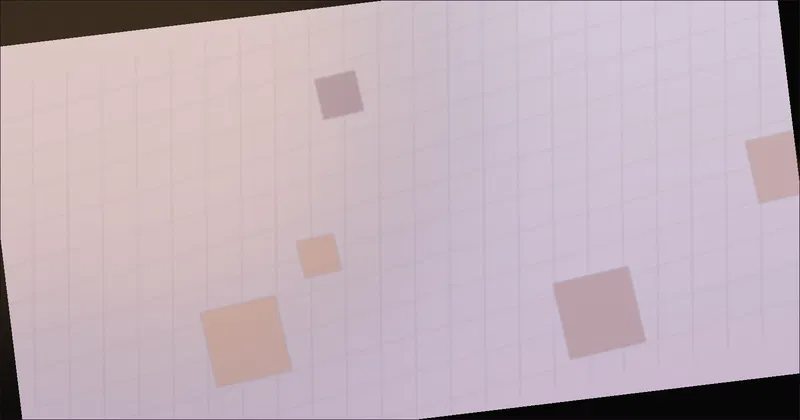 Laptop screen showing a short Python dictionary exercise beside a notebook